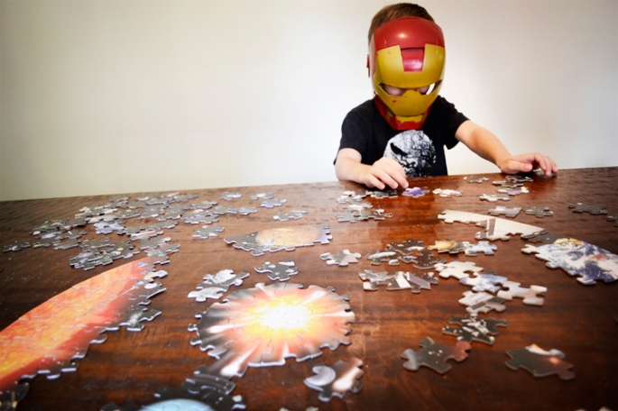 Ironman works a puzzle